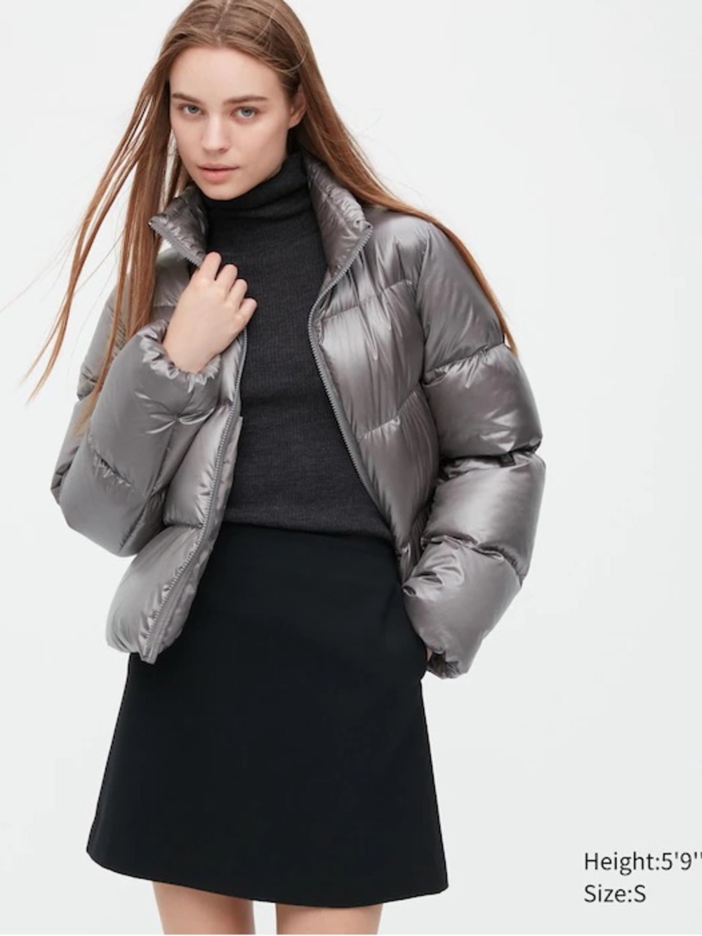 Uniqlo Ultra Light Weight Ultra
Warm Down Puffer packable Jacket Silver Medium